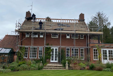 property undergoing roof maintenance