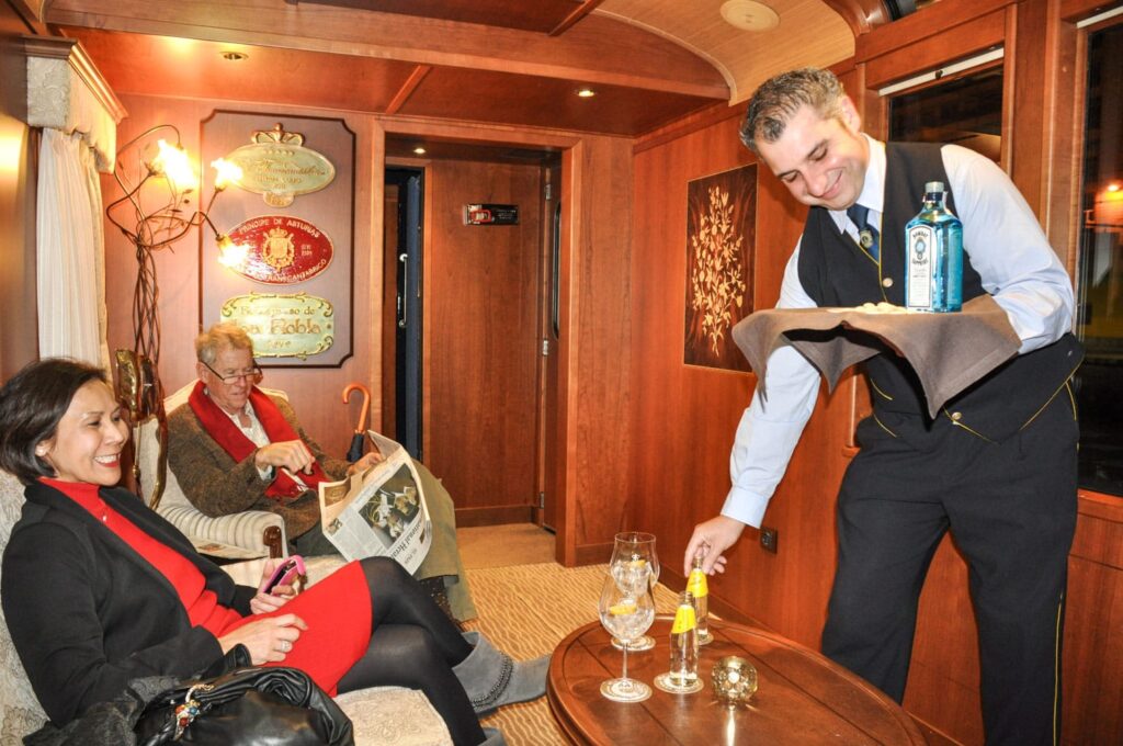 luxury train passengers in spain being served drinks