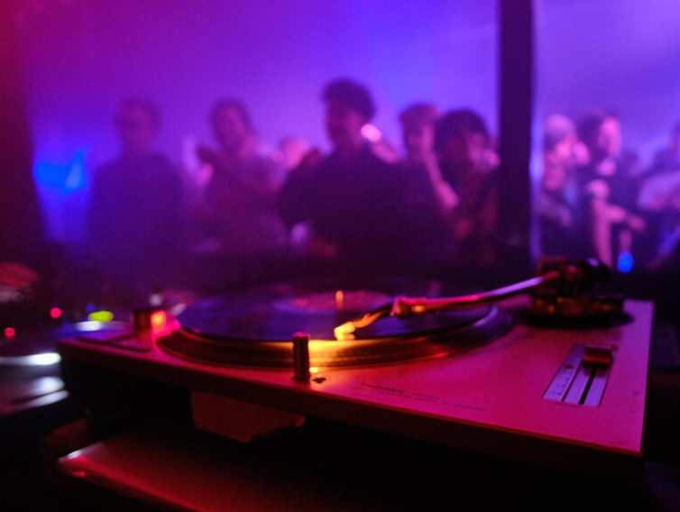 DJ playing to fans on best live music in Edinburgh